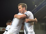 Harry Kane celebrates with Kyle Walker during the Premier League game between Norwich and Spurs on February 2, 2016
