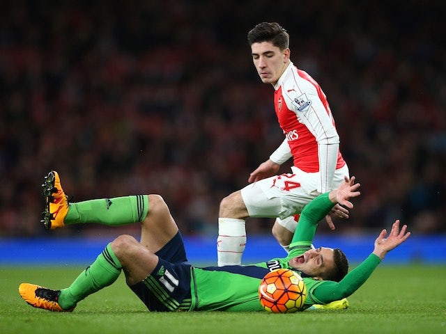 Hector Bellerin and Dusan Tadic in action during the Premier League game between Arsenal and Southampton on February 2, 2016
