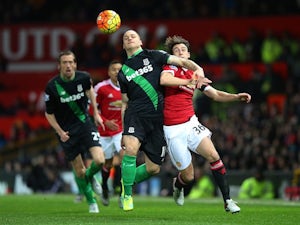 Marko Arnautovic and Matteo Darmian in action during the Premier League game between Manchester United and Stoke on February 2, 2016