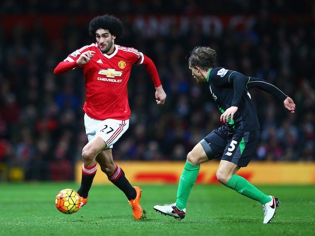 Marouane 'Shamone' Fellaini and Marc Muniesa in action during the Premier League game between Manchester United and Stoke on February 2, 2016