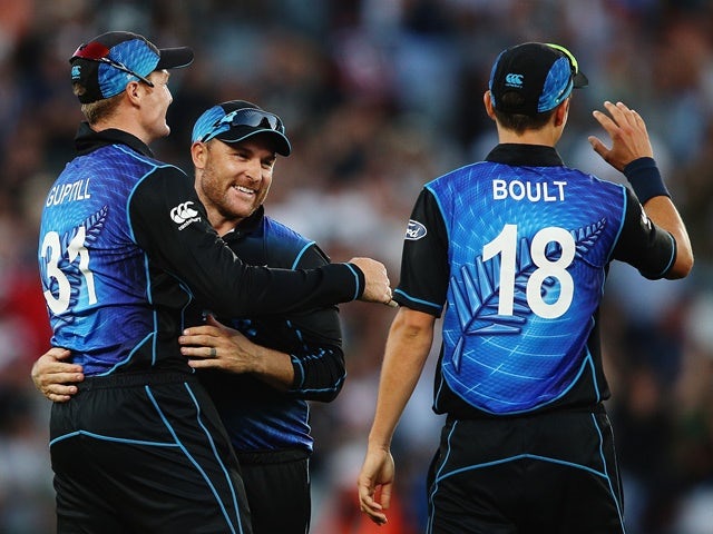 Martin Guptill, Brendon McCullum and Trent Boult celebrate after winning the one-day international match between New Zealand and Australia at Eden Park on February 3, 2016