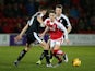 Nick Haughton and Conor Hourihane in action during the League Trophy semi-final between Fleetwood Town and Barnsley on February 4, 2016