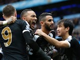 Riyad Mahrez celebrates with teammates during the Premier League game between Manchester City and Leicester City on February 6, 2016