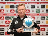Ronald Koeman poses with his manager of the month award for January 2016