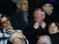 Sir Alex Ferguson watches on from the stands