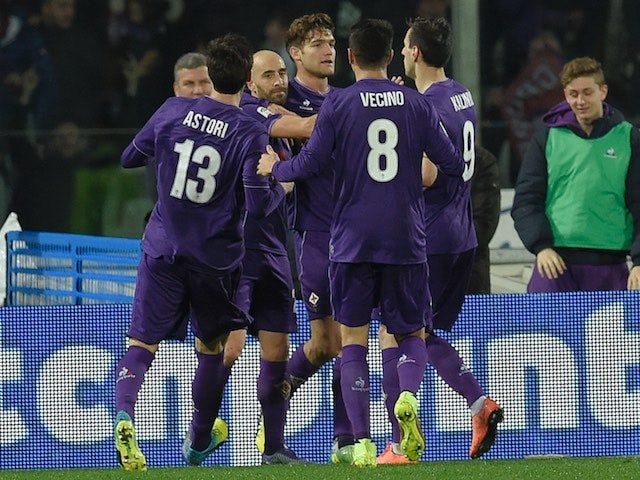 Borja Valero celebrates with teammates after scoring during the Serie A game between Fiorentina and Inter on February 14, 2016