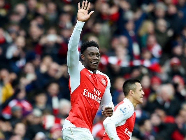 Danny Welbeck celebrates finding the winner during the Premier League game between Arsenal and Leicester City on February 14, 2016