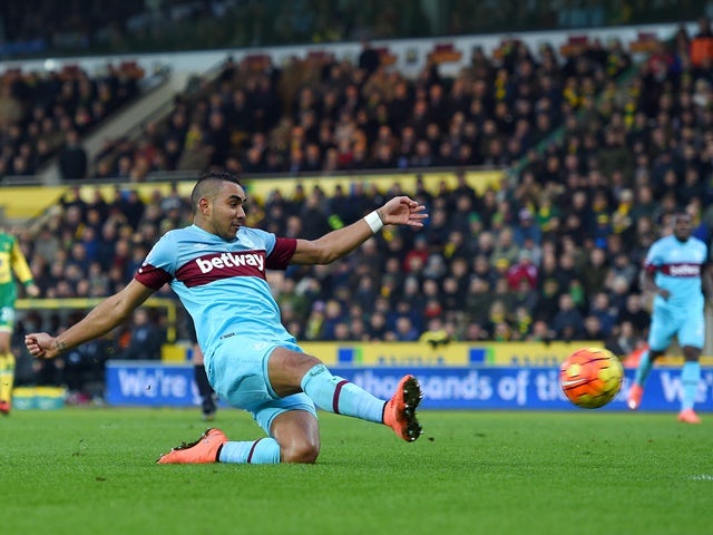 Dimitri Payet of West Ham United scores his team's first goal against Norwich City on February 13, 2016