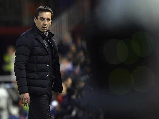 Gary Neville rocks his puffa during the Copa del Rey semi between Valencia and Barcelona on February 10, 2016