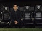 Gary Neville sits in the dugout during the Copa del Rey semi between Valencia and Barcelona on February 10, 2016