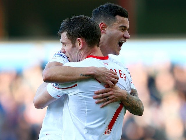 James Milner and Philippe Coutinho celebrate during the Premier League game between Aston Villa and Liverpool on February 14, 2016