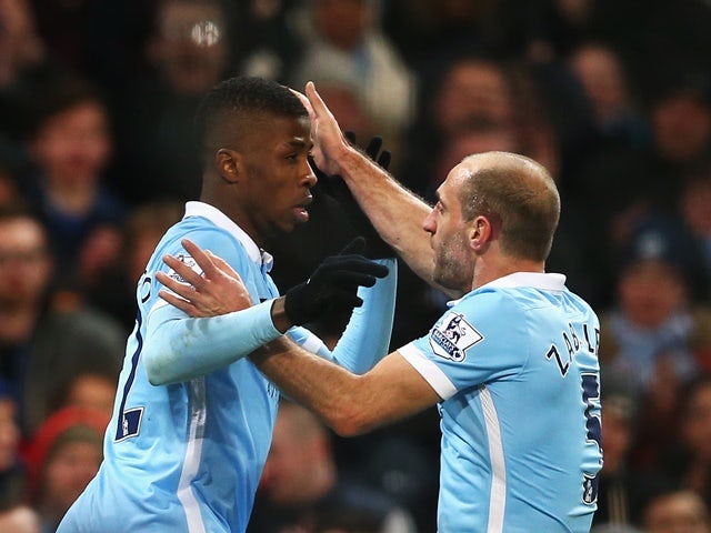  Kelechi Iheanacho celebrates scoring his goal with Pablo Zabaleta during the Premier League match between Manchester City and Tottenham Hotspur on February 14, 2016