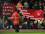 Liverpool fans protest against ticket prices during the FA Cup fourth-round replay against West Ham United on February 9, 2016