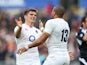 Bros Owen Farrell and Jonathan Joseph celebrate during the Six Nations game between Italy and England on February 14, 2016