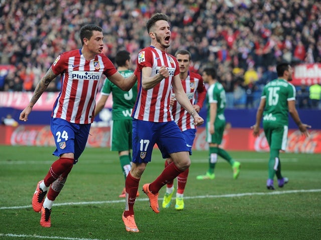 Saul Niguez celebrates with Jose Maria Gimenez after scoring his team's second goal during the La Liga match between Atletico Madrid and Eibar on February 6, 2016