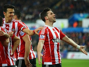  Shane Long of Southampton celebrates scoring his team's first goal against Swansea City on February 13, 2016