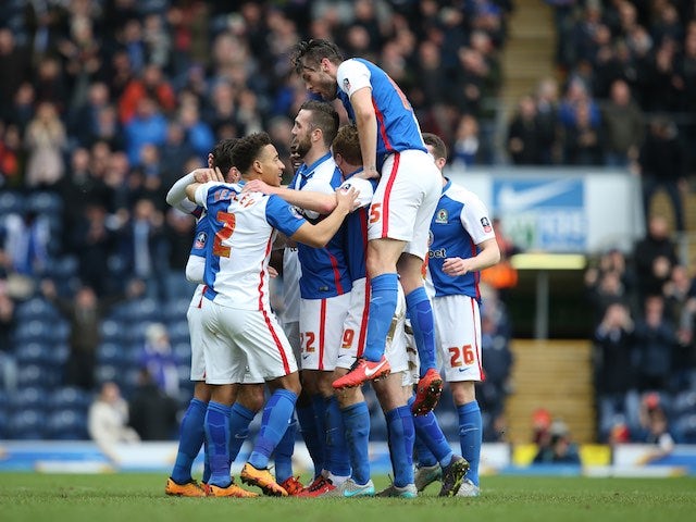 Ben Marshall is congratulated by teammates during the FA Cup game between Blackburn Rovers and West Ham United on February 20, 2016