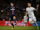 Gary Cahill battles with Angel Di Maria during the Champions League encounter between Paris Saint-Germain and Chelsea on February 16, 2016
