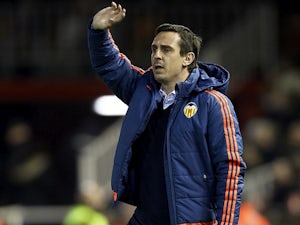 Valencia boss Neville calls for calm