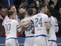 John Obi Mikel is congratulated by teammates after scoring during the Champions League encounter between Paris Saint-Germain and Chelsea on February 16, 2016