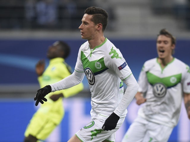 Wolfsburg's Julian Draxler reacts after scoring against Gent on February 17, 2016