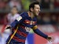 Barcelona's Lionel Messi celebrates after scoring a goal during the La Liga match against Sporting Gijon on February 17, 2016