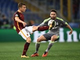 Roma's Lucas Digne vies with Real Madrid's Dani Carvajal during the Champions League match on February 17, 2016