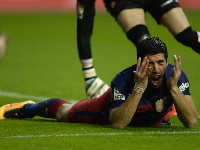 Barcelona's Luis Suarez shouts after missing an attempt on goal against Sporting Gijon on February 17, 2016