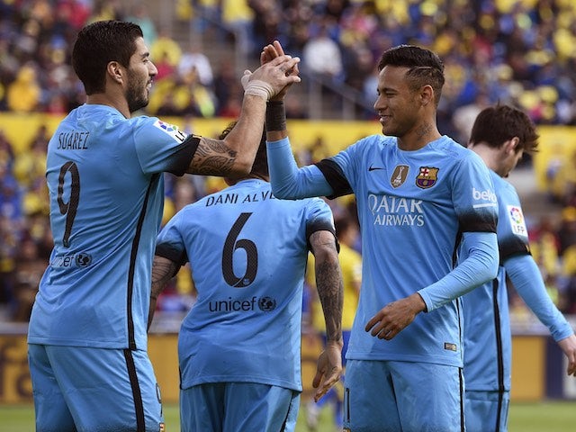 Luis Suarez celebrates with Neymar during the La Liga game between Las Palmas and Barcelona on February 20, 2016