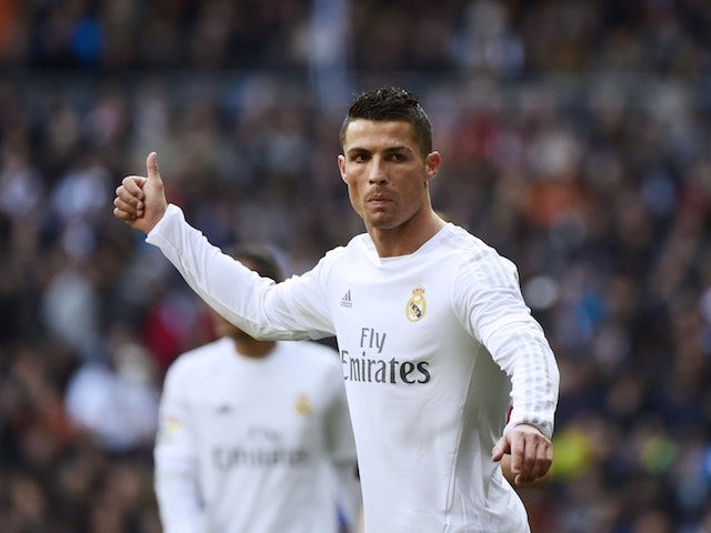 Cristiano Ronaldo sticks a thumb up during the La Liga game between Real Madrid and Atletico Madrid on February 27, 2016