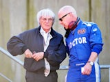 Bernie Ecclestone talks with FIA doctor Gary Hartstein on August 29, 2009