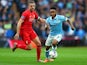 Jordan Henderson and a highly alarmed Raheem Sterling in action during the League Cup final between Liverpool and Manchester City on February 28, 2016