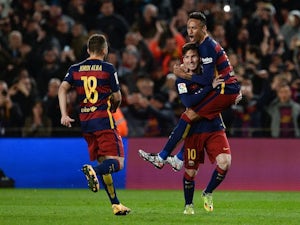 Messi, Pique net as Barca beat Sevilla