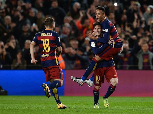 Lionel Messi celebrates scoring with Neymar as Jordi Alba approaches during the La Liga game between Barcelona and Sevilla on February 28, 2016