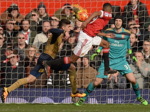 Marcus Rashford heads in his second during the Premier League game between Manchester United and Arsenal on February 28, 2016