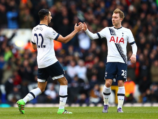 Nacer Chadli celebrates with Christian Eriksen during the Premier League game between Tottenham Hotspur and Swansea City on February 28, 2016