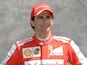 Ferrari test driver Pedro de la Rosa of Spain poses on March 14, 2013