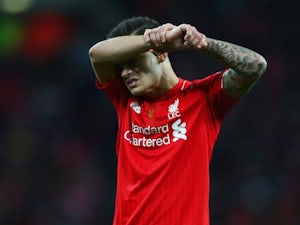 Philippe Coutinho reacts after Manchester City win the League Cup on February 28, 2016