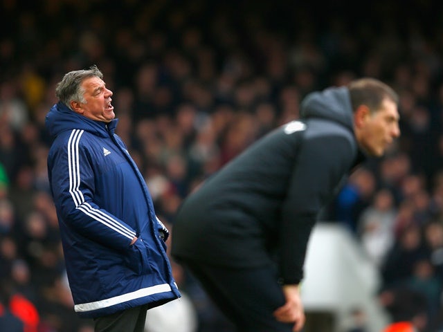 Sam Allardyce of Sunderland "looks frustrated" as West Ham United manager Slaven Bilic watches the game on February 27, 2016