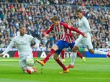 Sergio Ramos, Raphael Varane and Fernando Torres in action during the La Liga game between Real Madrid and Atletico Madrid on February 27, 2016