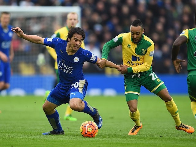 Shinji Okazaki and Nathan Redmond in action during the Premier League game between Leicester City and Norwich City on February 27, 2016