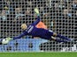 Willy Caballero saves Adam Lallana's penalty during the League Cup final between Liverpool and Manchester City on February 28, 2016