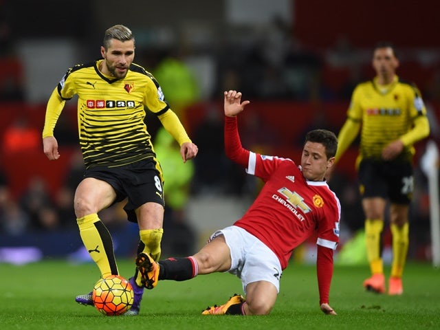 Ander Herrera slides in to tackle Valon Berami during the Premier League match between Manchester United and Watford at on March 2, 2016