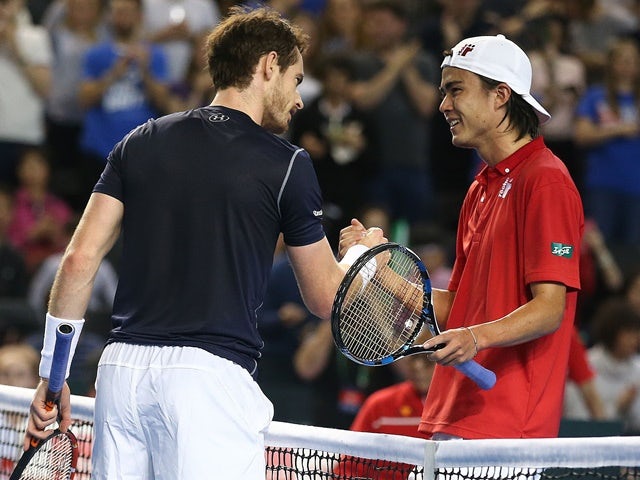 Great Britain's Andy Murray shakes hands with Japan's Taro Daniel after winning their Davis Cup world group first-round men's singles match on March 4, 2016
