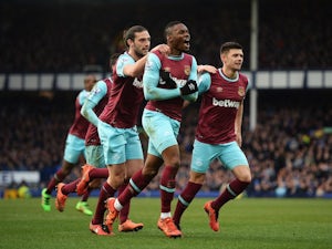 Diafra Sakho celebrates with Andy Carroll and Aaron Cresswell during the Premier League game between Everton and West Ham United on March 5, 2016