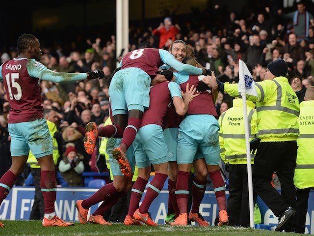 Dimitri Payet celebrates scoring the winner during the Premier League game between Everton and West Ham United on March 5, 2016