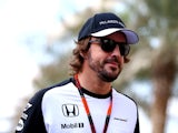 Fernando Alonso of McLaren Honda arrives in the paddock before final practice for the Abu Dhabi Grand Prix at Yas Marina Circuit on November 28, 2015