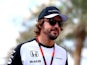 Fernando Alonso of McLaren Honda arrives in the paddock before final practice for the Abu Dhabi Grand Prix at Yas Marina Circuit on November 28, 2015