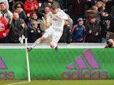 Gylfi Sigurdsson of Swansea City celebrates scoring his team's first goal against Norwich City at Liberty Stadium on March 5, 2016