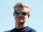 Marcus Ericsson walks across the paddock during previews to the Canadian Grand Prix on June 4, 2015